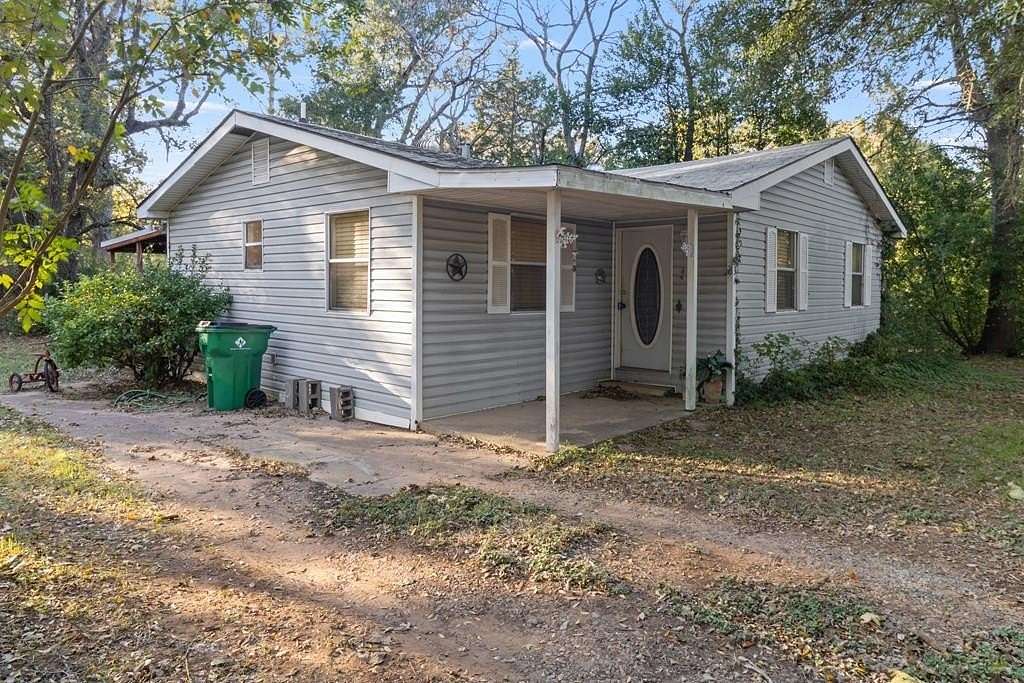 3.34 Acres of Land with Home for Sale in Palestine, Texas