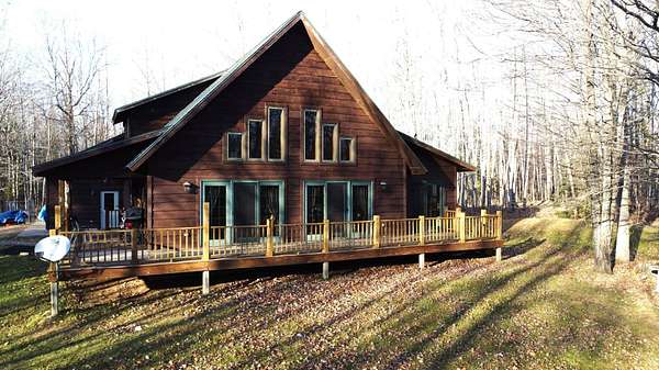 19 Acres of Recreational Land with Home for Sale in Tomahawk, Wisconsin