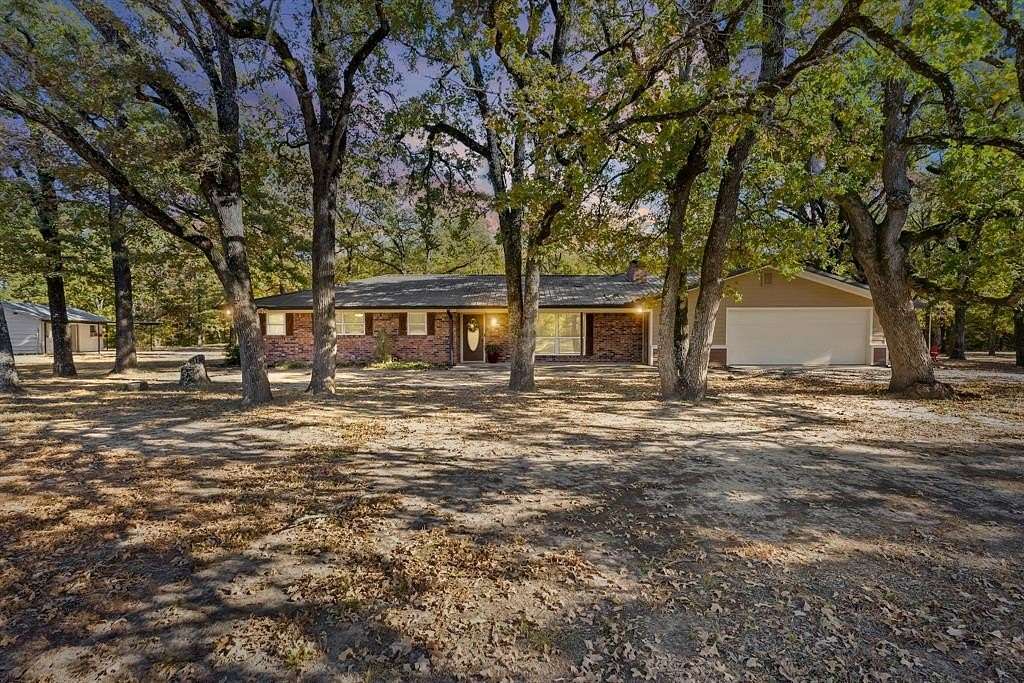 7 Acres of Residential Land with Home for Sale in Greenville, Texas