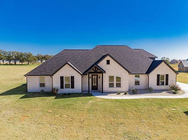 2 Acres of Residential Land with Home for Sale in Poolville, Texas