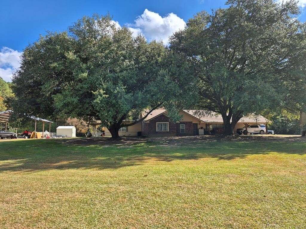 13.3 Acres of Land with Home for Sale in Summit, Mississippi