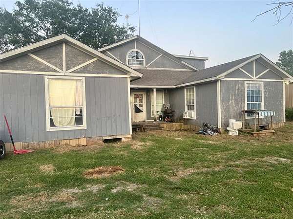 3 Acres of Residential Land with Home for Sale in Quinlan, Texas