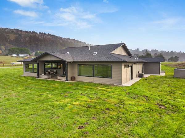 1.89 Acres of Residential Land with Home for Sale in Smith River, California