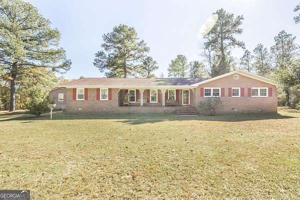 19.1 Acres of Land with Home for Sale in Byron, Georgia