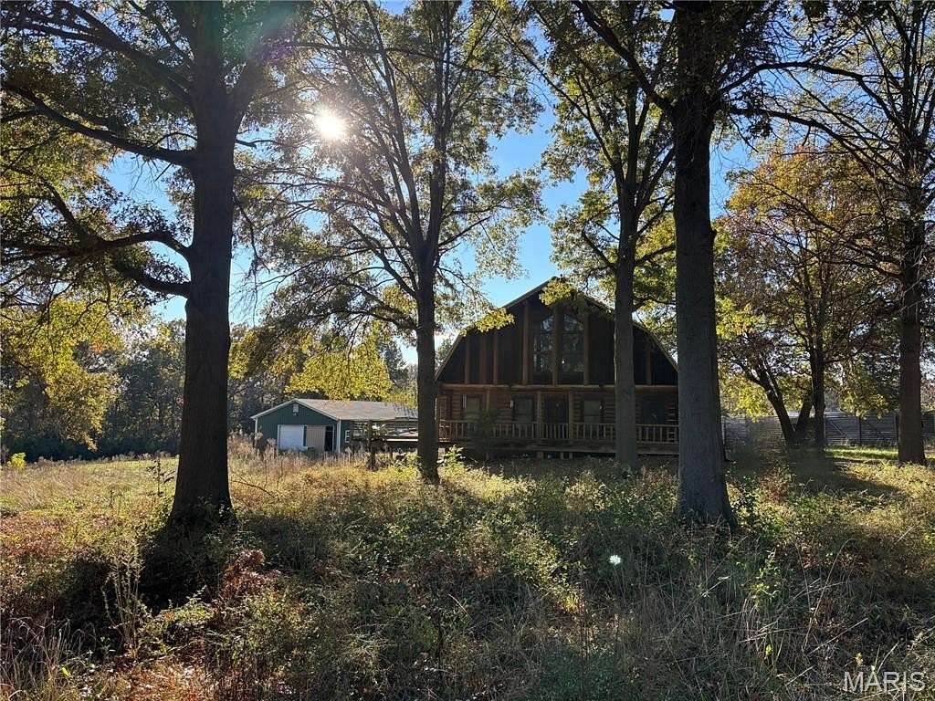 2.36 Acres of Residential Land with Home for Sale in Clark Township, Missouri