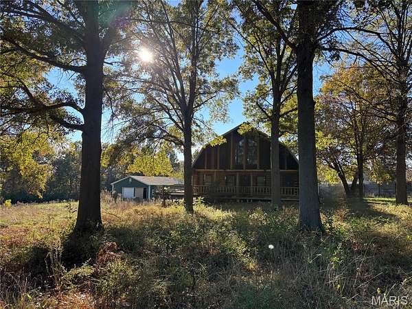 2.36 Acres of Residential Land with Home for Sale in Clark Township, Missouri