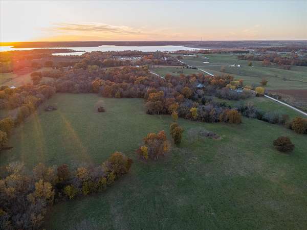 153 Acres of Land with Home for Sale in Stockton, Missouri