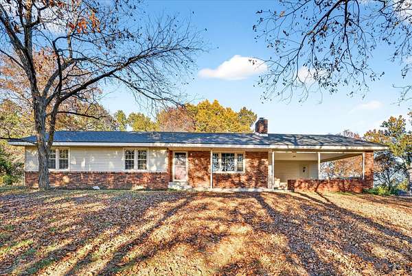 153 Acres of Land with Home for Sale in Stockton, Missouri