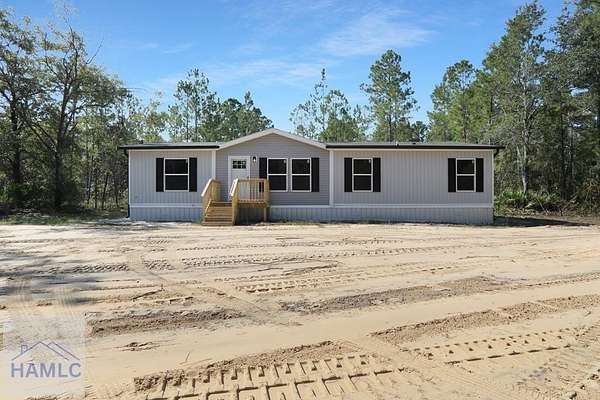 2.86 Acres of Residential Land with Home for Sale in Jesup, Georgia