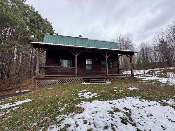 12.6 Acres of Land with Home for Sale in Malone, New York