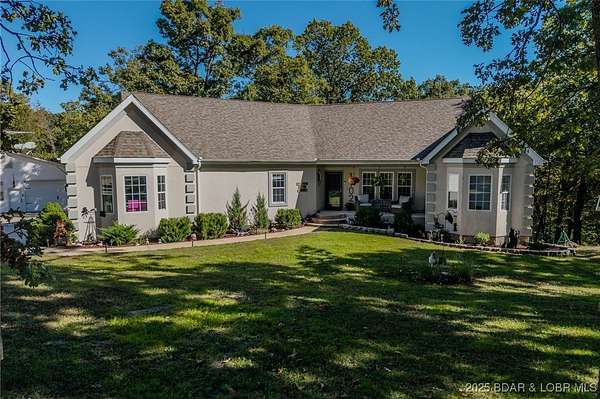 8.9 Acres of Residential Land with Home for Sale in Camdenton, Missouri