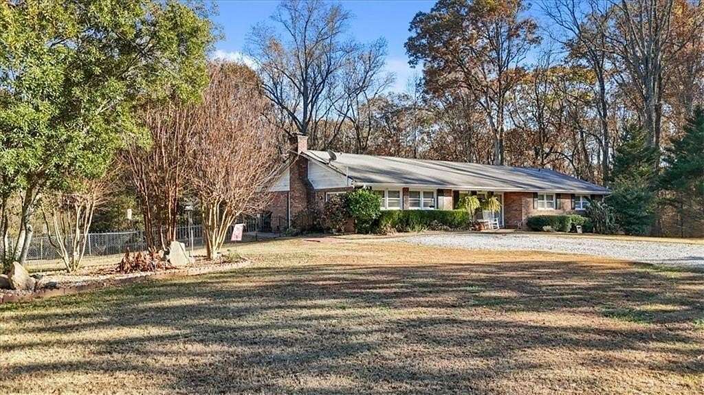 4 Acres of Residential Land with Home for Sale in Roswell, Georgia