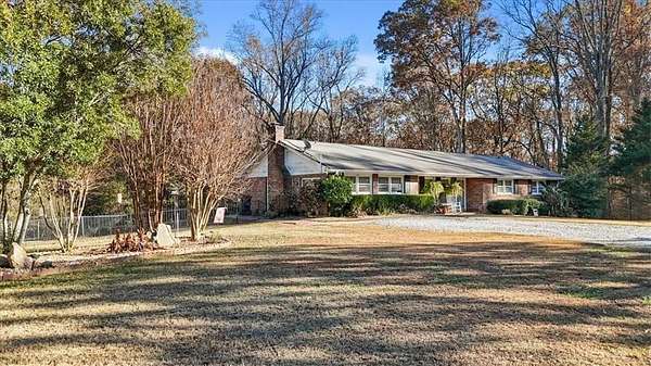4 Acres of Residential Land with Home for Sale in Roswell, Georgia