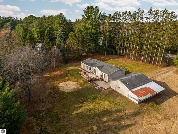 3 Acres of Residential Land with Home for Sale in Fife Lake, Michigan