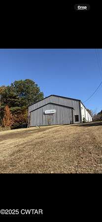 10 Acres of Residential Land with Home for Sale in Jackson, Tennessee