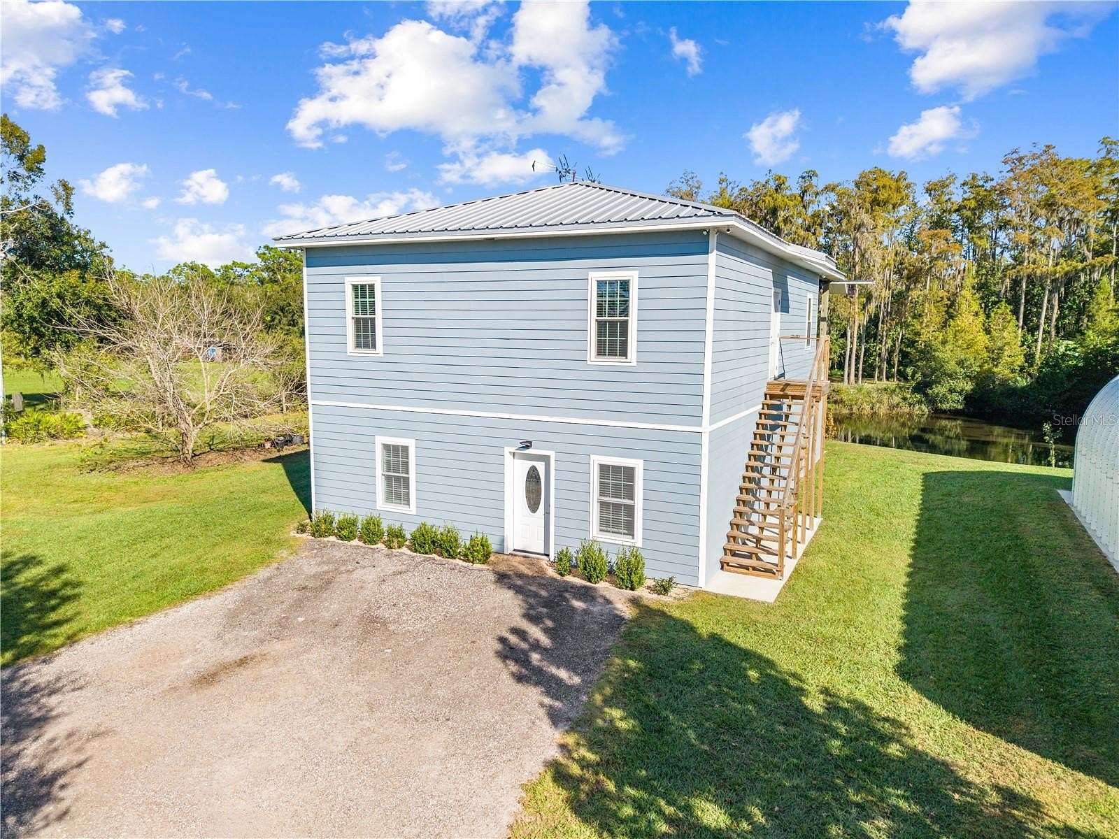 2.38 Acres of Land with Home for Sale in St. Cloud, Florida