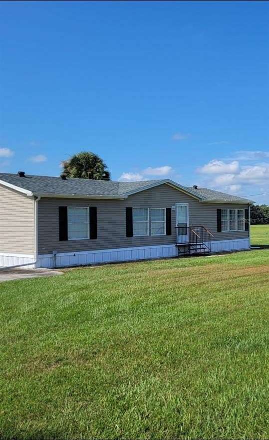 89.2 Acres of Agricultural Land with Home for Sale in Reddick, Florida