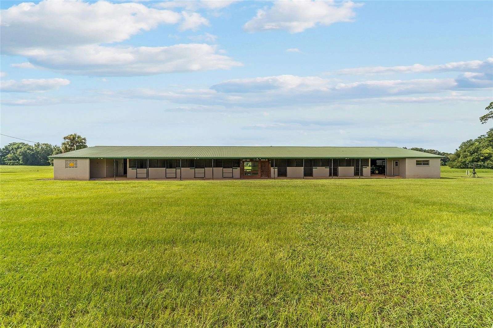 89.2 Acres of Agricultural Land with Home for Sale in Reddick, Florida