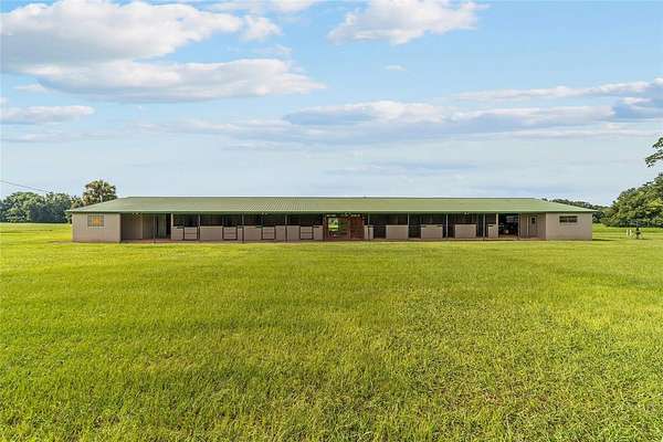 89.2 Acres of Agricultural Land with Home for Sale in Reddick, Florida