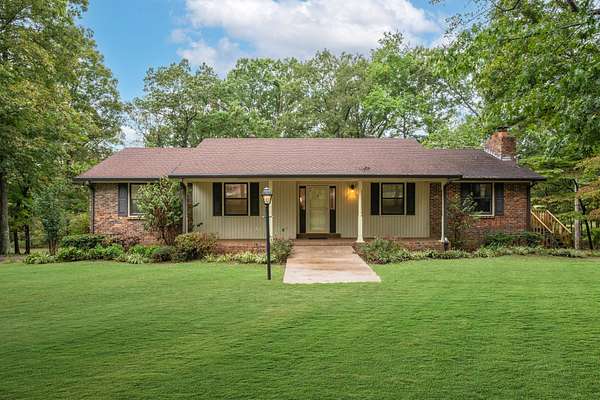 5.14 Acres of Residential Land with Home for Sale in White Bluff, Tennessee