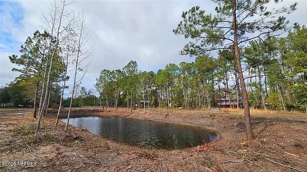 7.62 Acres of Land with Home for Sale in Hilliard, Florida