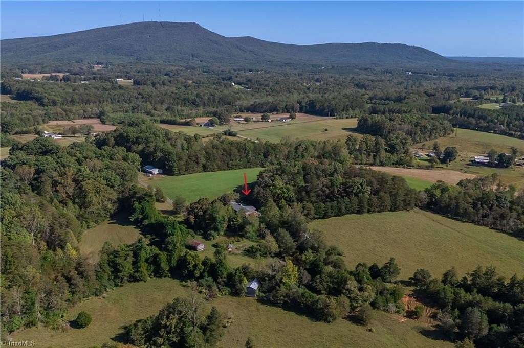 88 Acres of Agricultural Land with Home for Sale in Pinnacle, North Carolina