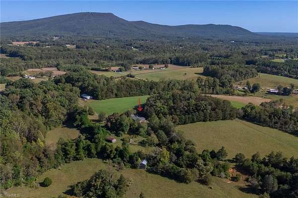 88 Acres of Agricultural Land with Home for Sale in Pinnacle, North Carolina