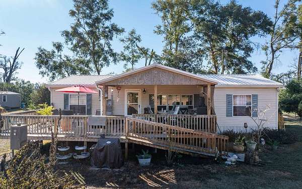 2.24 Acres of Residential Land with Home for Sale in Live Oak, Florida