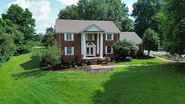 2.55 Acres of Residential Land with Home for Sale in Madisonville, Kentucky