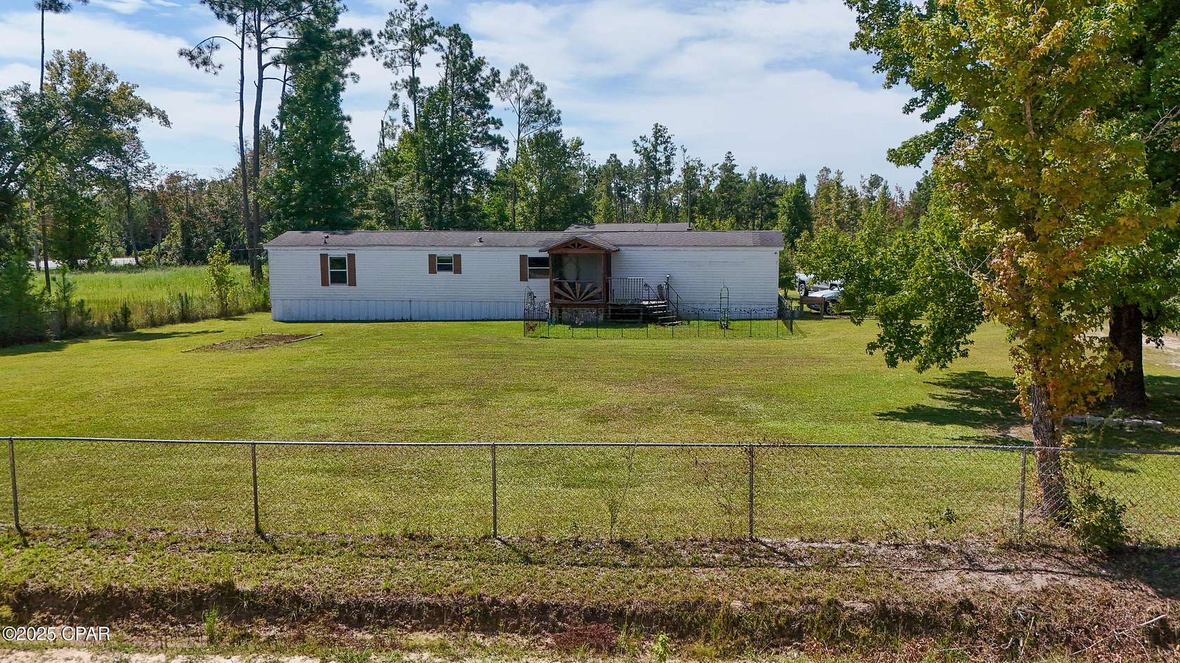 2.9 Acres of Residential Land with Home for Sale in Fountain, Florida