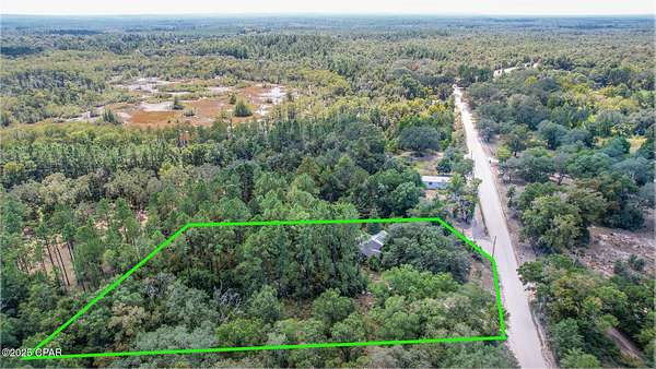 2 Acres of Residential Land with Home for Sale in Bonifay, Florida