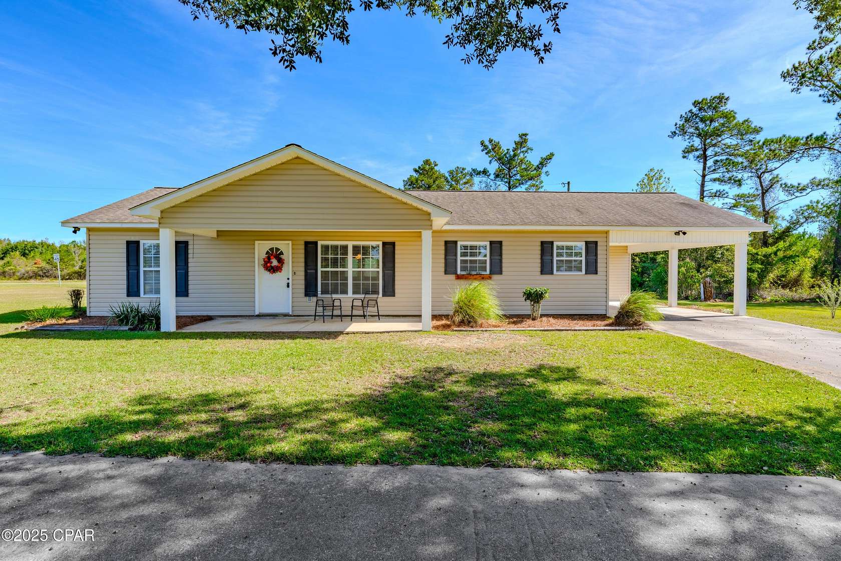 2 Acres of Residential Land with Home for Sale in Grand Ridge, Florida