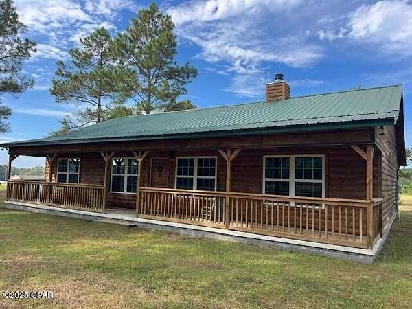 3 Acres of Residential Land with Home for Sale in Bonifay, Florida
