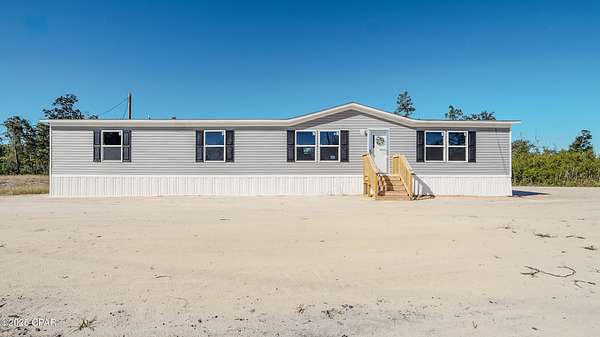 1.58 Acres of Residential Land with Home for Sale in Youngstown, Florida