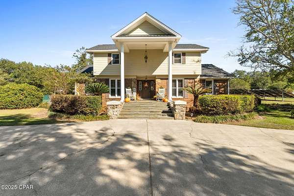 2 Acres of Residential Land with Home for Sale in Graceville, Florida