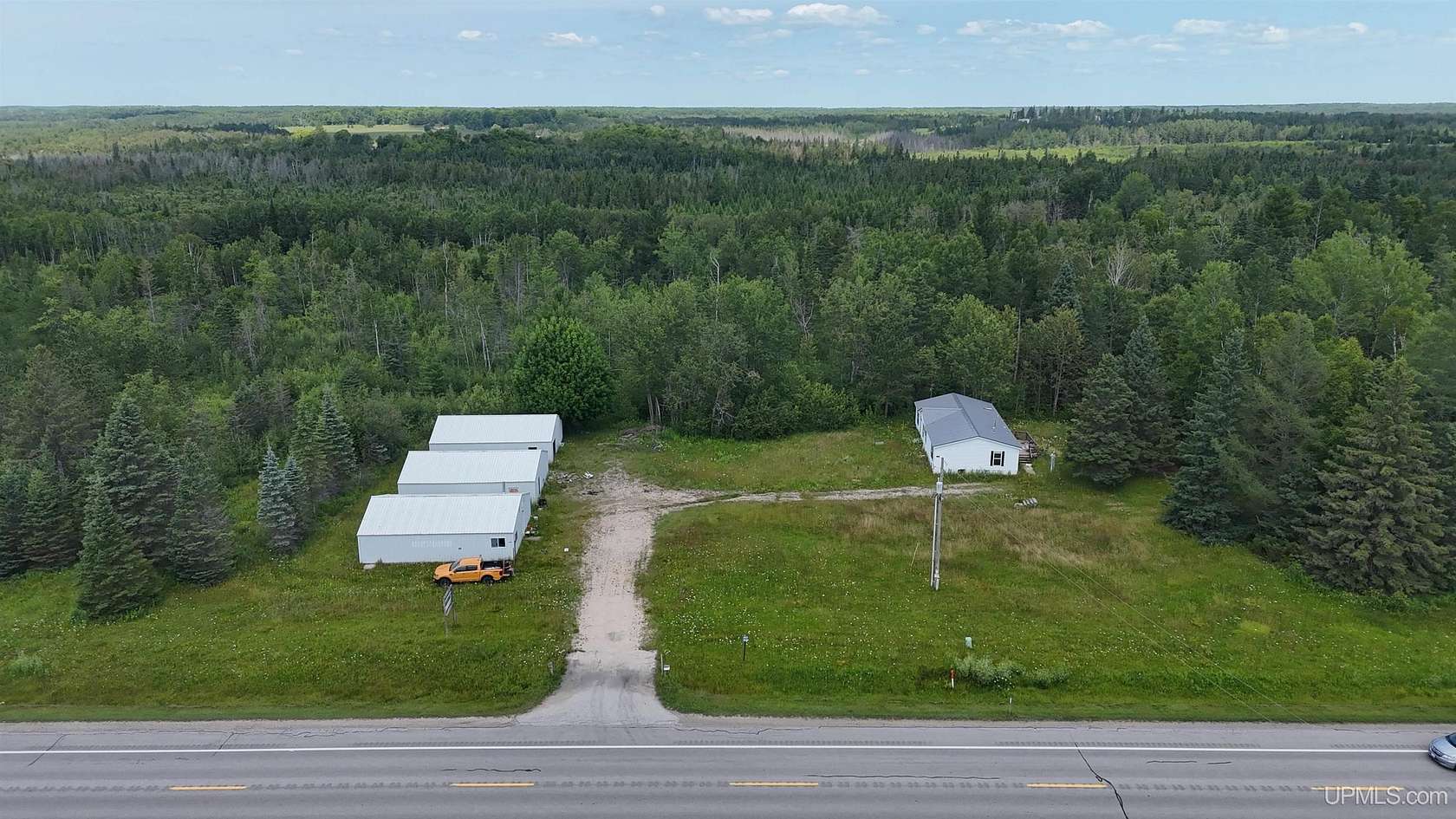 80 Acres of Land with Home for Sale in Gulliver, Michigan