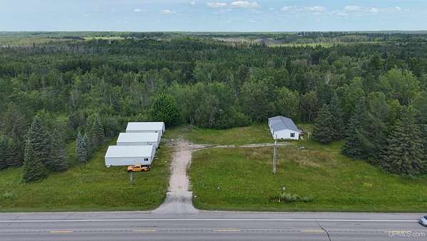 80 Acres of Land with Home for Sale in Gulliver, Michigan