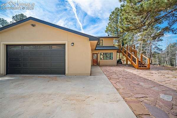 2.14 Acres of Residential Land with Home for Sale in Woodland Park, Colorado