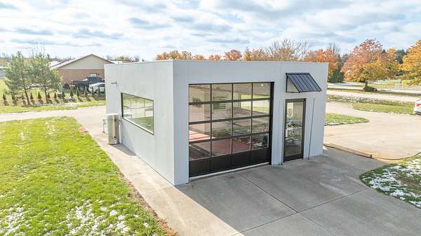 0.75 Acres of Improved Mixed-Use Land for Sale in Huntsville, Ohio