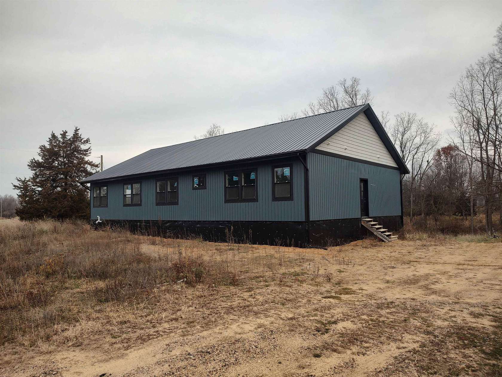 17.4 Acres of Land with Home for Sale in Owosso, Michigan