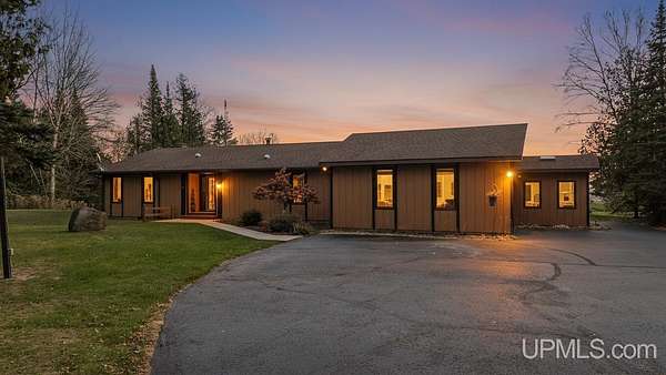 2.23 Acres of Residential Land with Home for Sale in Bark River, Michigan