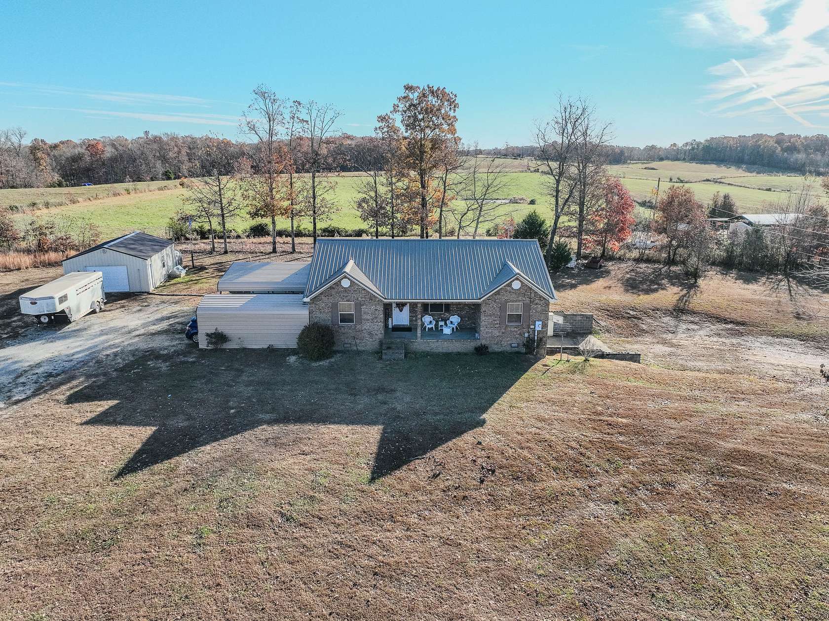 5 Acres of Residential Land with Home for Sale in Iron City, Tennessee