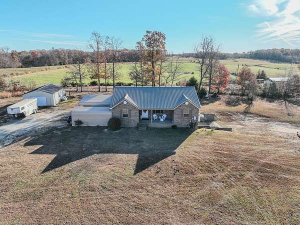 5 Acres of Residential Land with Home for Sale in Iron City, Tennessee