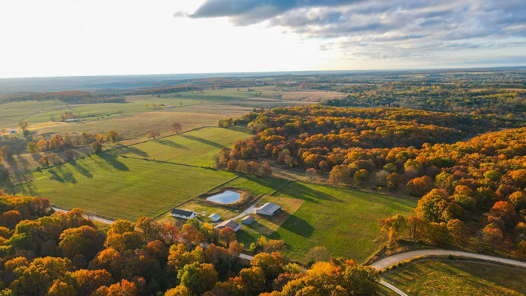 68 Acres of Land with Home for Sale in Wheatland, Missouri