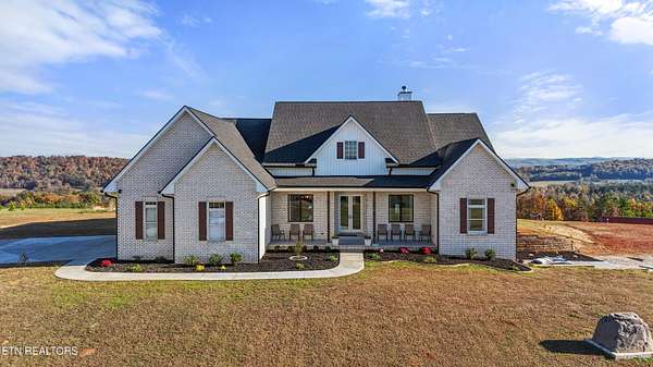 12.1 Acres of Land with Home for Sale in Philadelphia, Tennessee