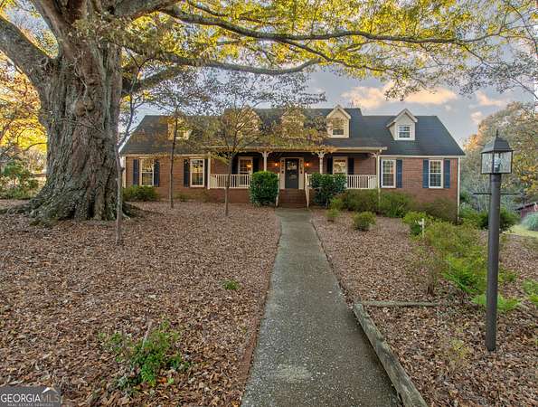 8.22 Acres of Land with Home for Sale in Hampton, Georgia