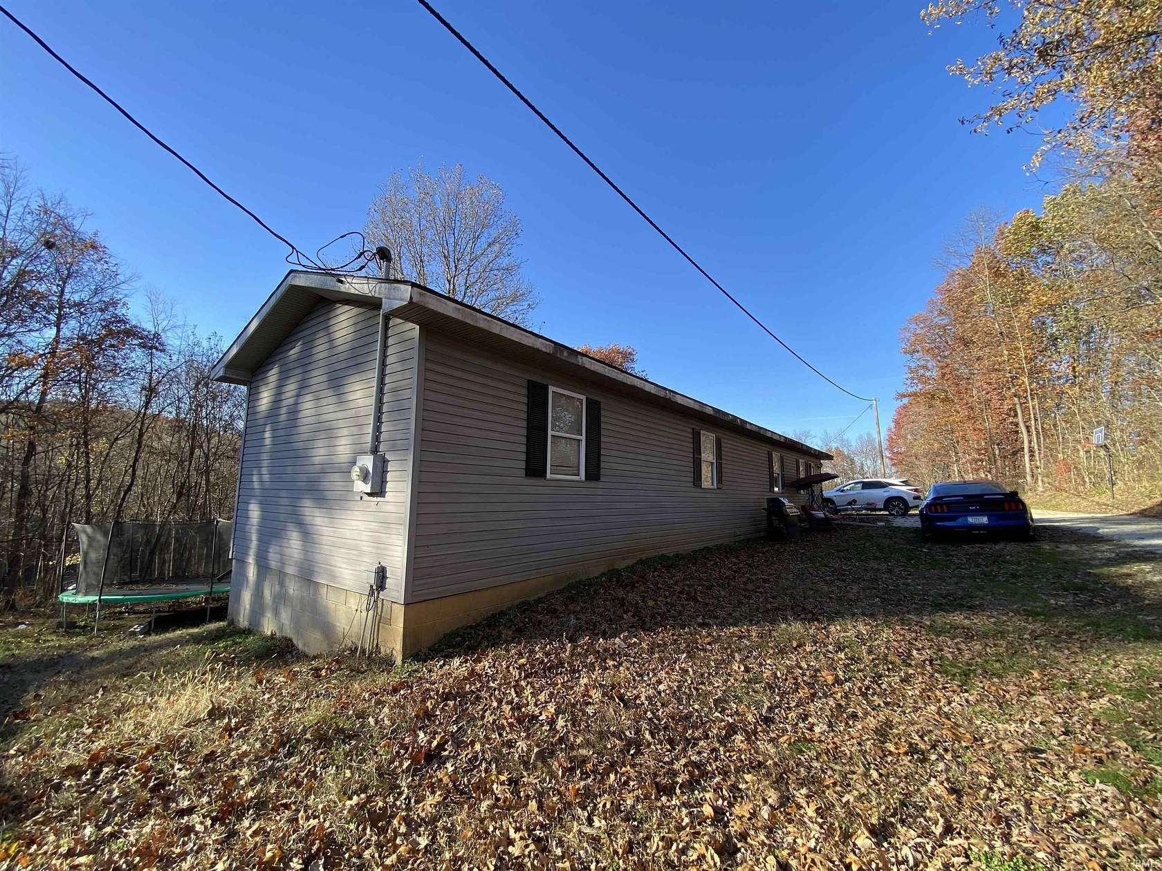 4 Acres of Residential Land with Home for Sale in Mitchell, Indiana