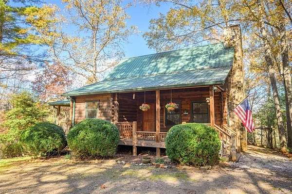 7.78 Acres of Land with Home for Sale in Franklin, North Carolina