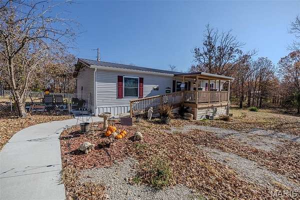 3.44 Acres of Residential Land with Home for Sale in Lebanon, Missouri