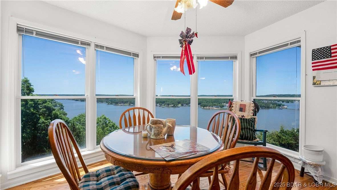 8.2 Acres of Residential Land with Home for Sale in Sunrise Beach, Missouri